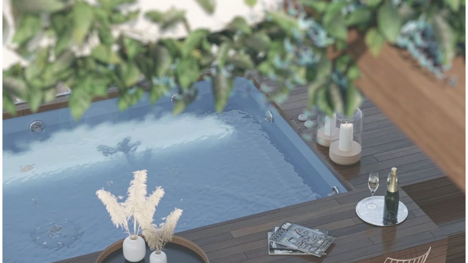 Moderna área de relajación al aire libre con piscina, champán y velas para un máximo placer.