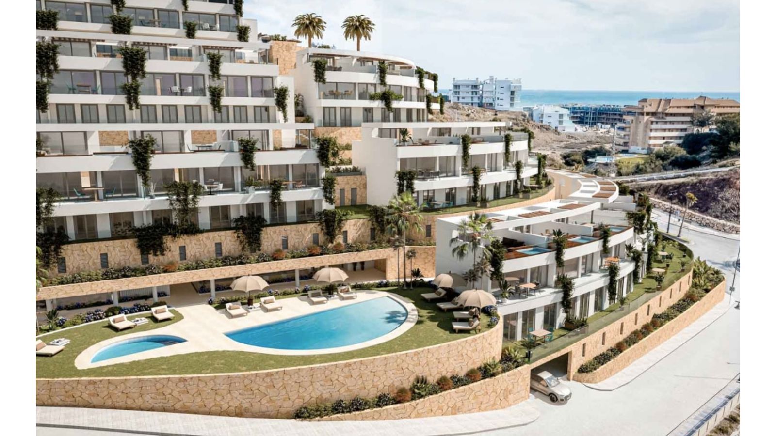 Apartamentos modernos con piscina y vistas al mar en The Kos.